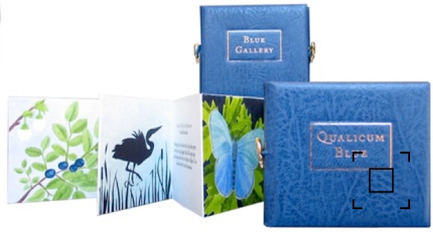 Two books show fron and back covers and stencilled images in Qualicum Blue.